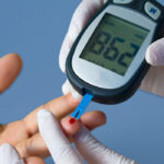 finger being pricked for diabetes