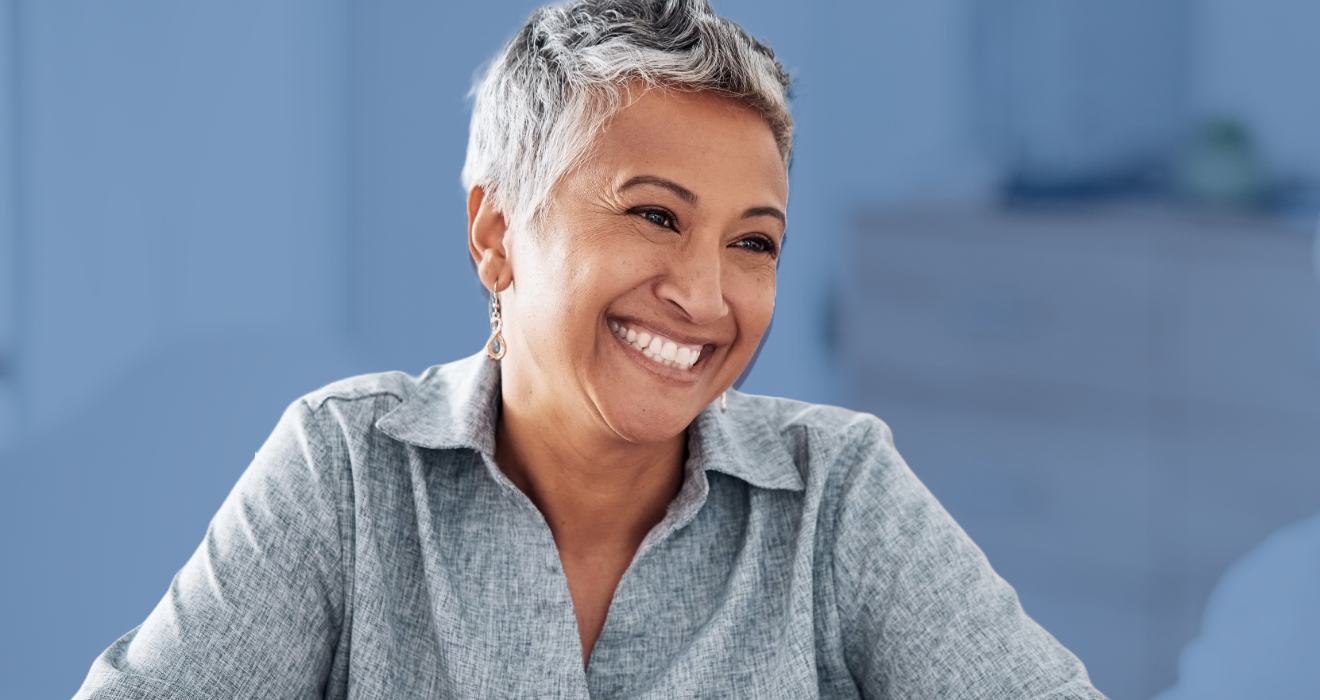 woman with grey hair smiling