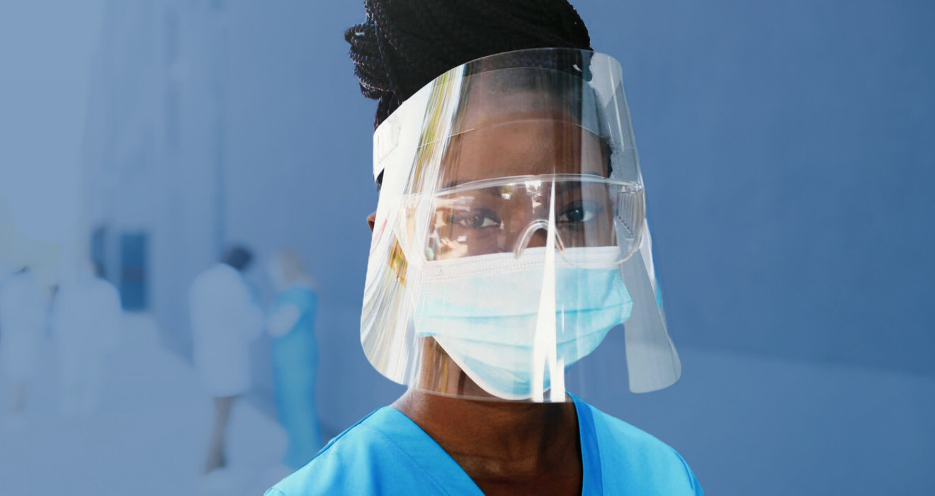 nurse with mask on and extra protection