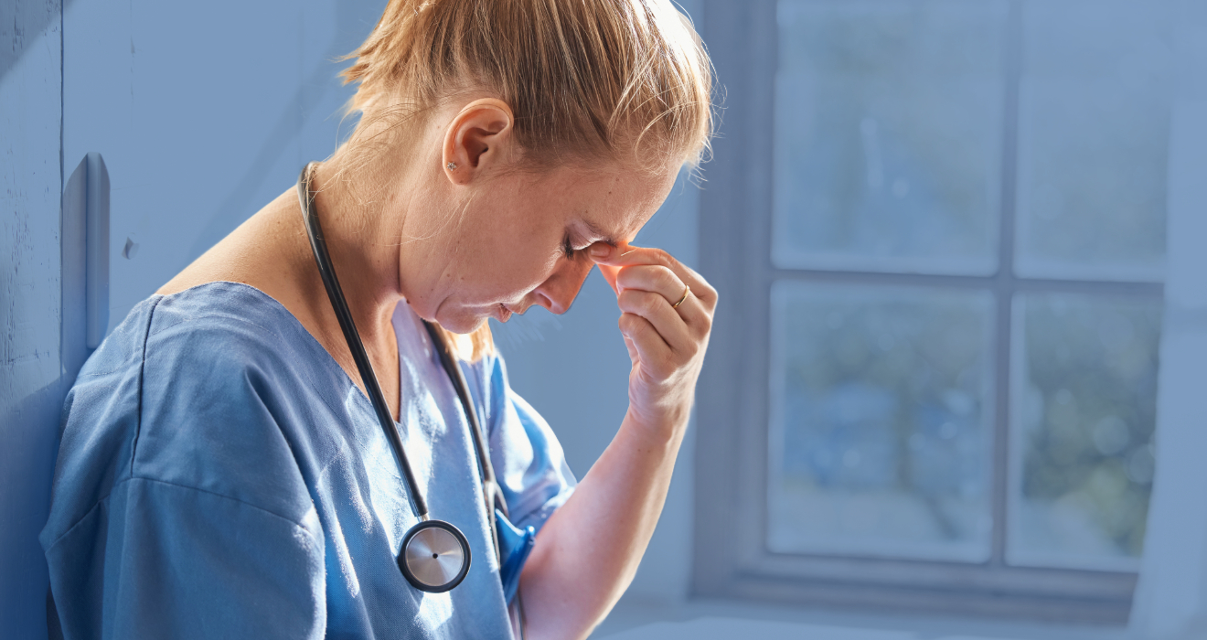 frustrated nurse looking down